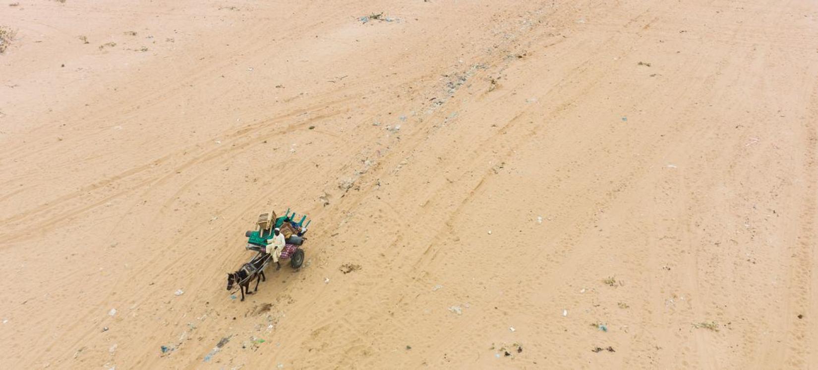 A man who who has fled violence in Sudan arrives in Chad.