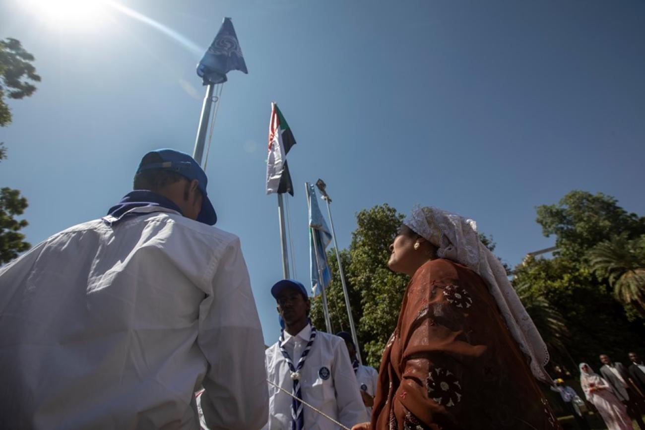 DSG hoisting the UN flag at the UN Day commemoration in Khartoum