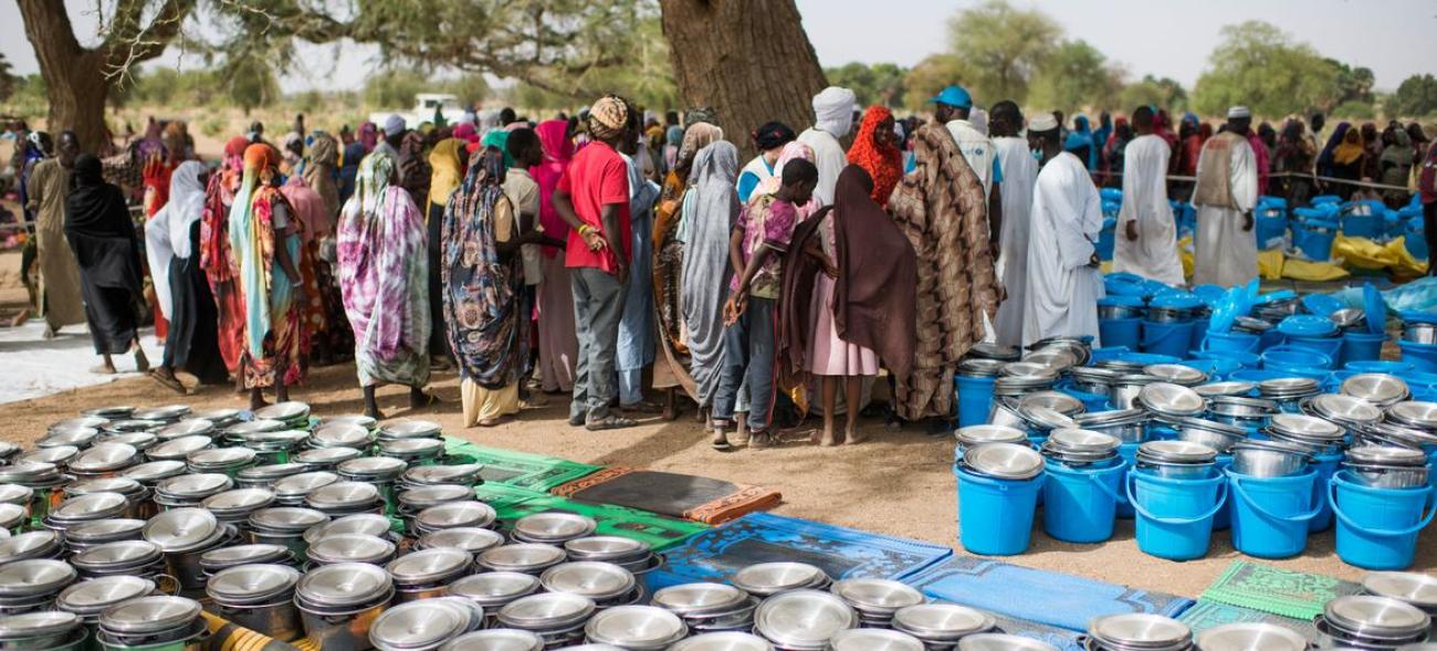 Food and other items are distributed in Chad to people who have fled violence in Sudan.